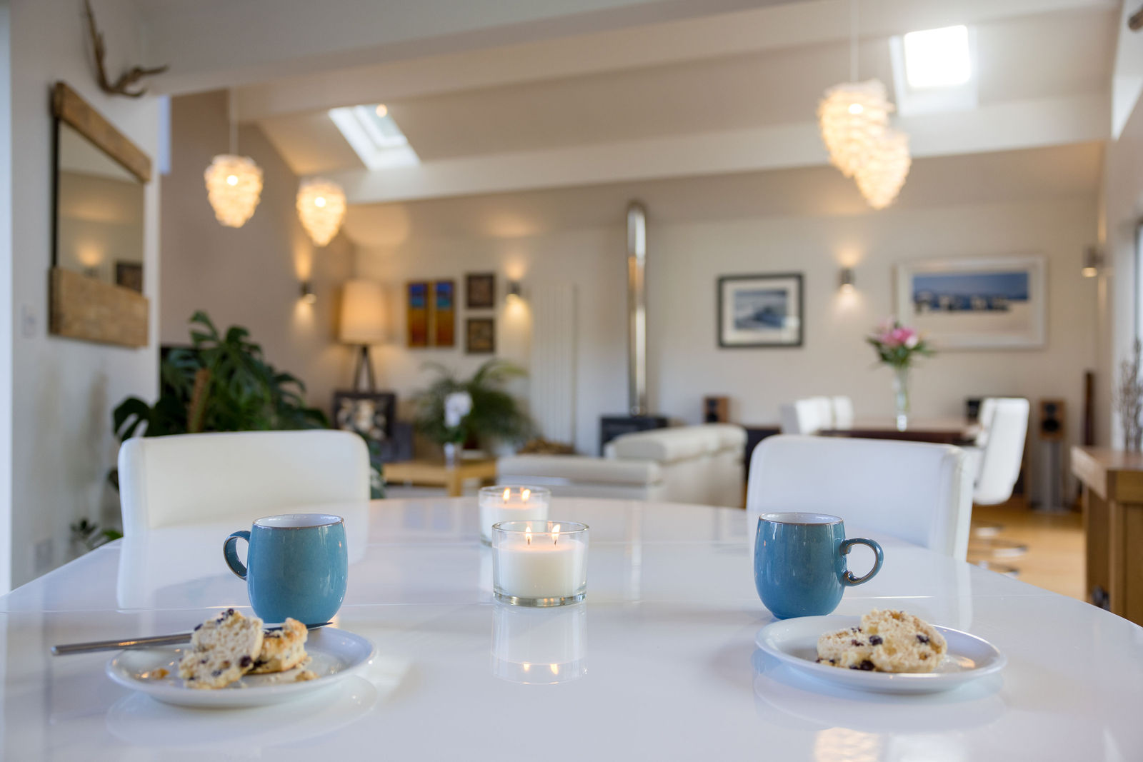 Bright open-plan kitchen and dining space featured in a real estate video tour, by Inspire Drone Media, TA Full Capture Media
