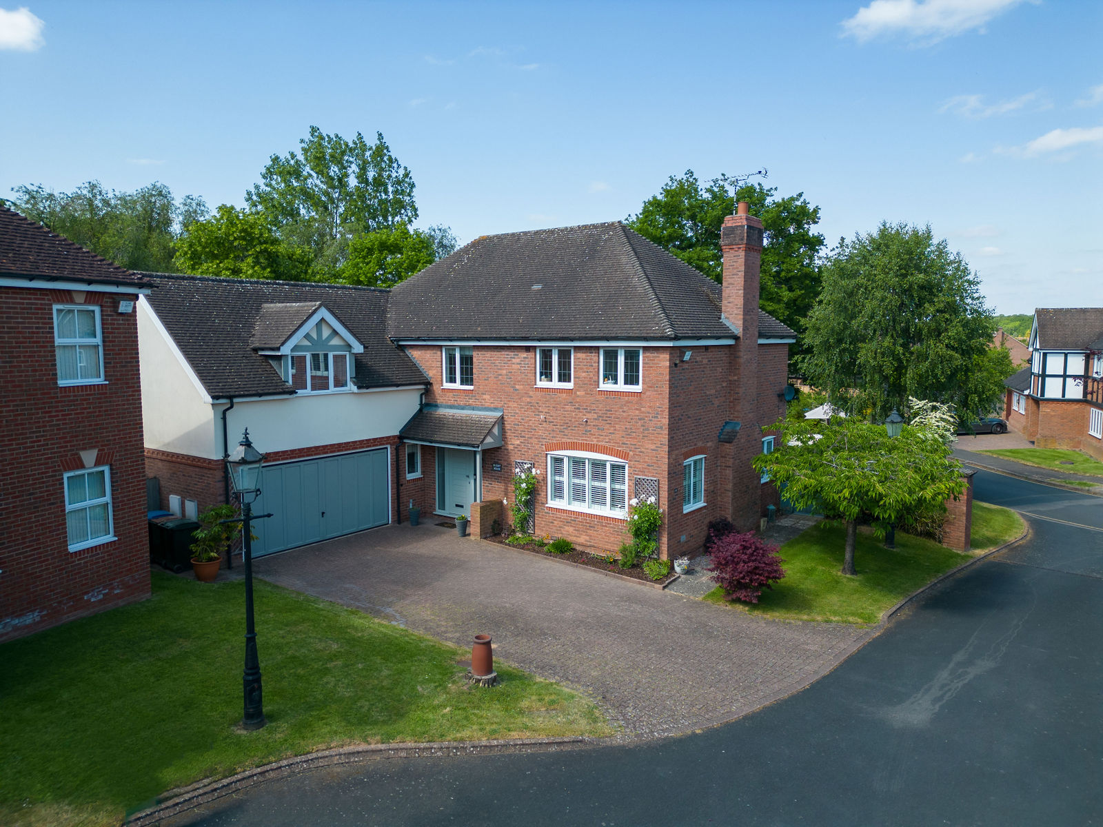 Aerial property photography of a modern detached home and driveway, by Inspire Drone Media, TA Full Capture Media