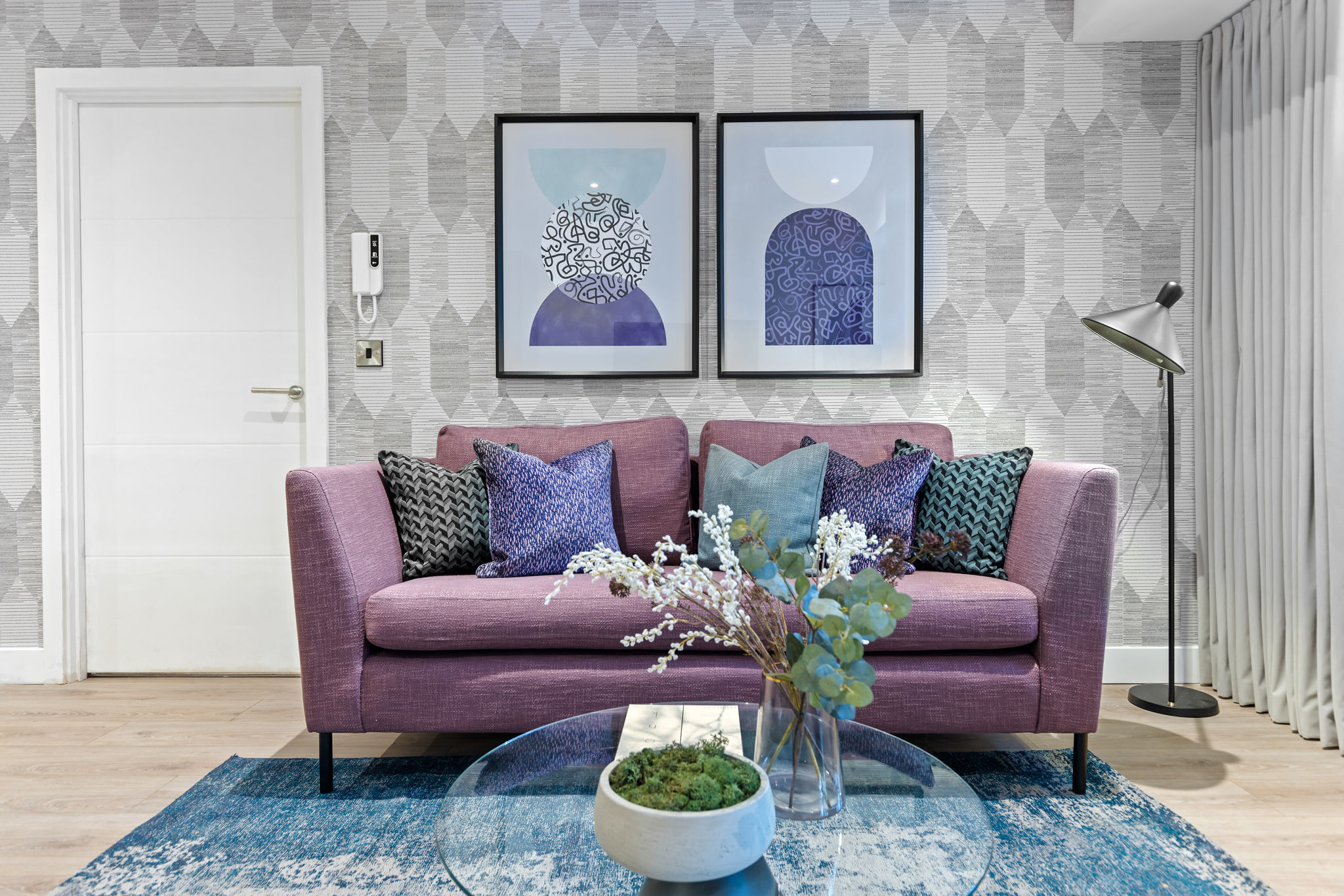Contemporary living room with purple sofa