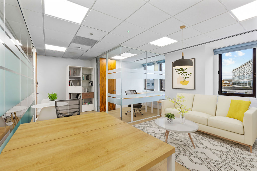 Modern commercial office space with glass partitions and contemporary design