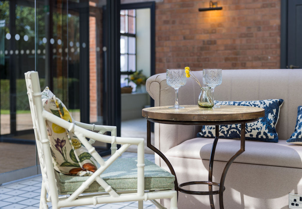Contemporary lounge area in commercial show home with designer furnishings