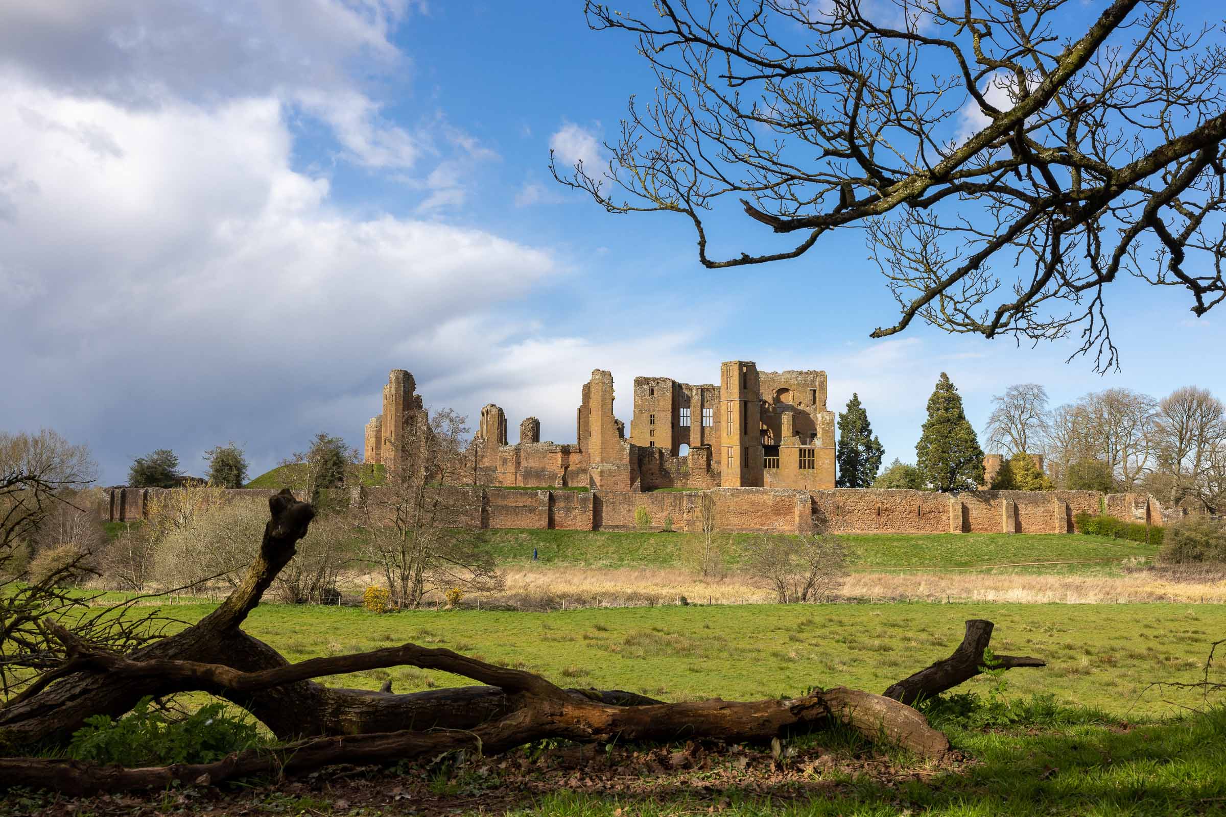 Historic castle ruins in countryside landscape