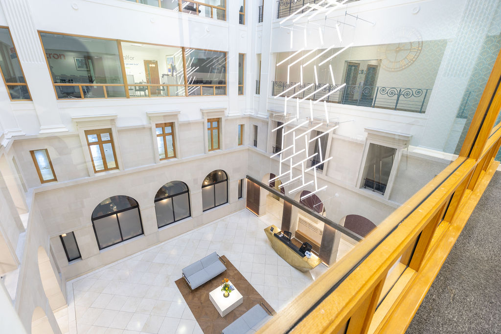 Grand commercial building atrium with multi-level architecture at Brindley Place