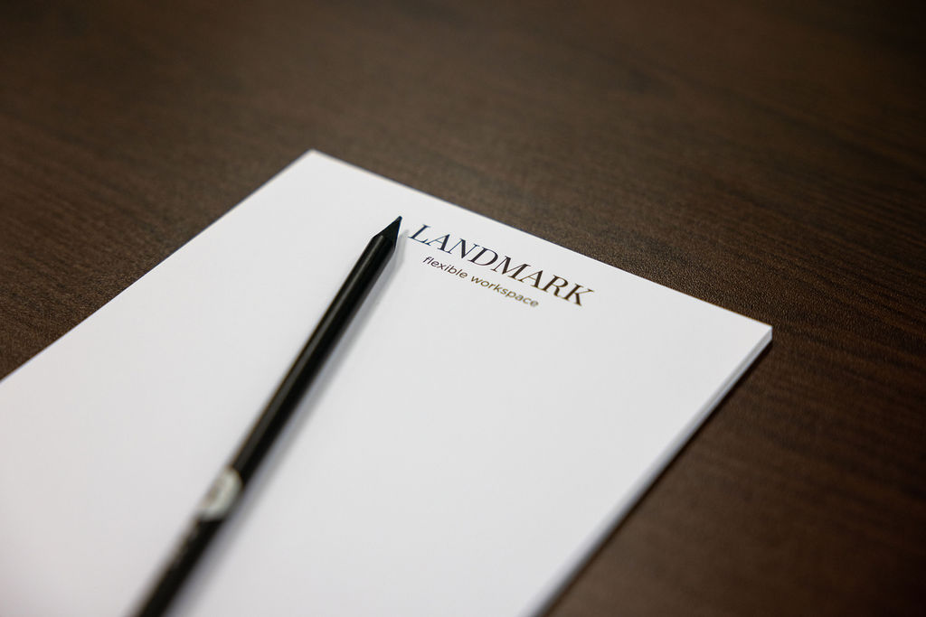 Landmark flexible workspace branding detail on professional stationery