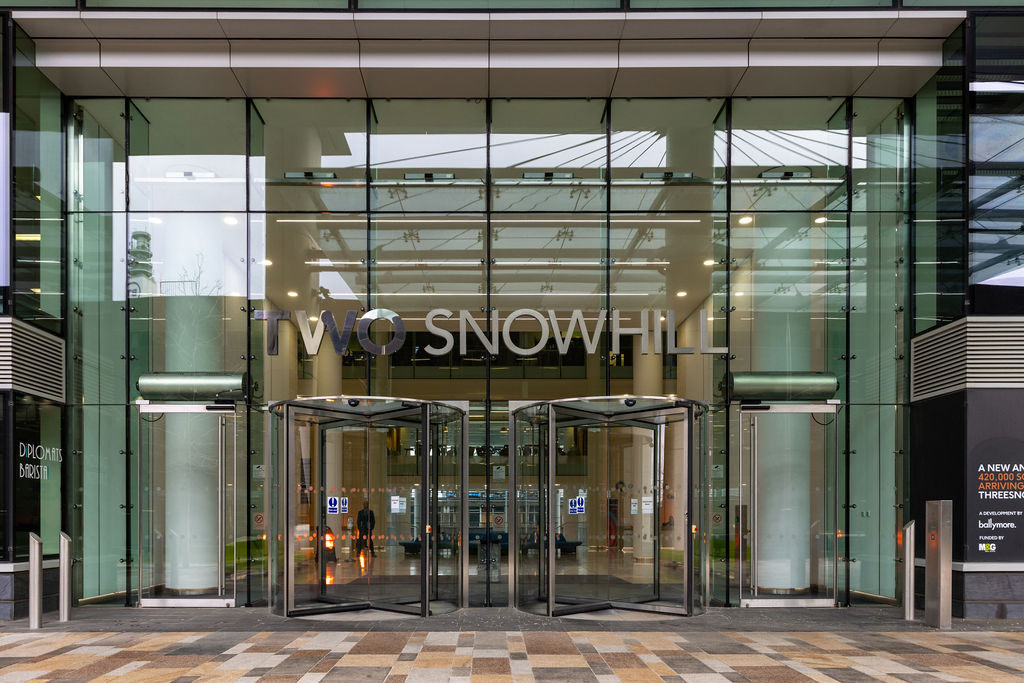 Snow Hill commercial building entrance with modern revolving doors