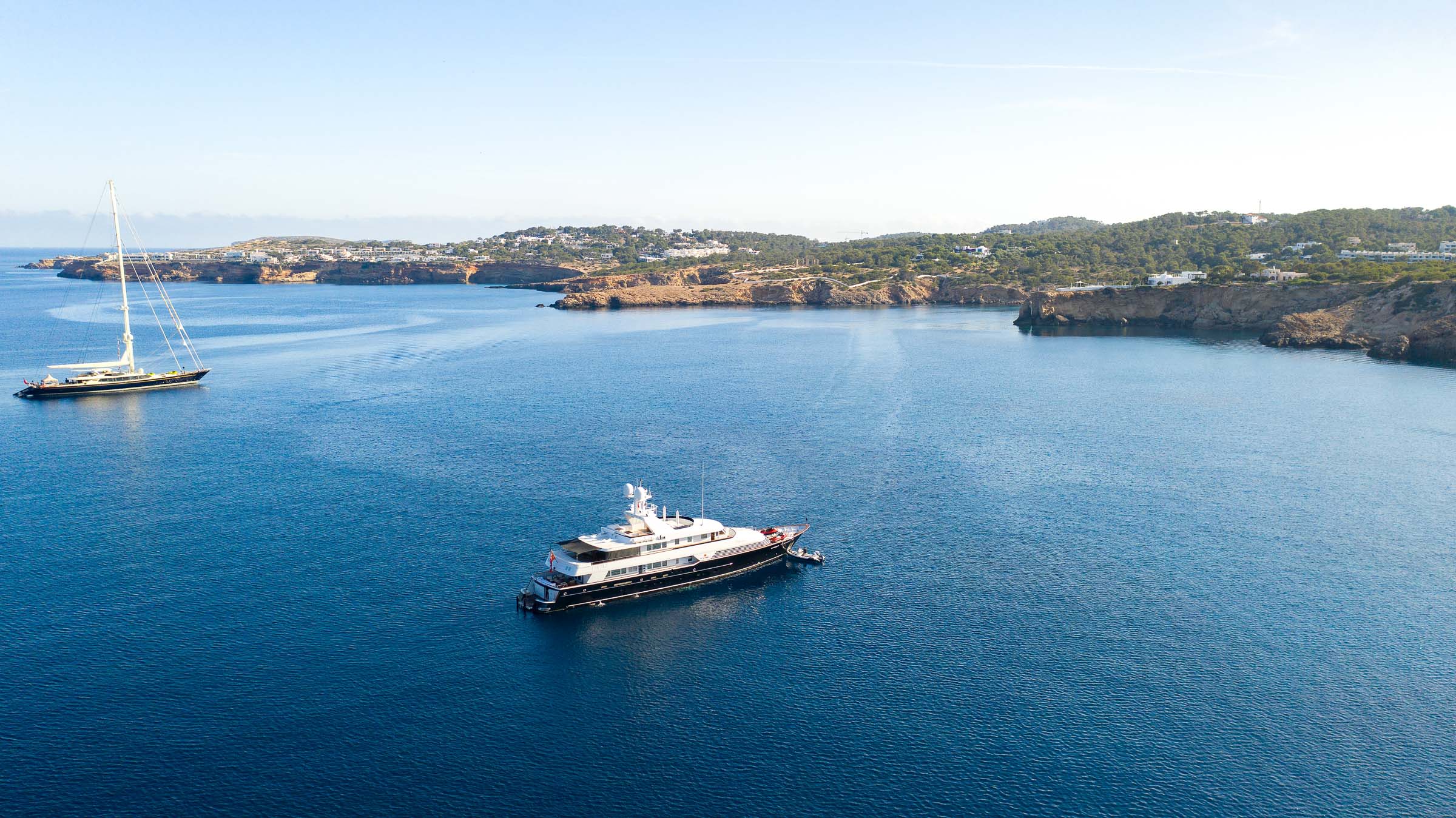 Aerial view of luxury yacht in Mediterranean bay